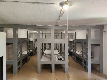 Interior photo of the cabin. Highlighted is the end of the cabin where the bunks are located.